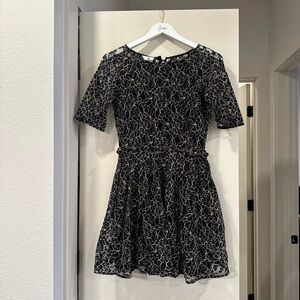 DOLCE VITA Elegant Black and White Lace Dress